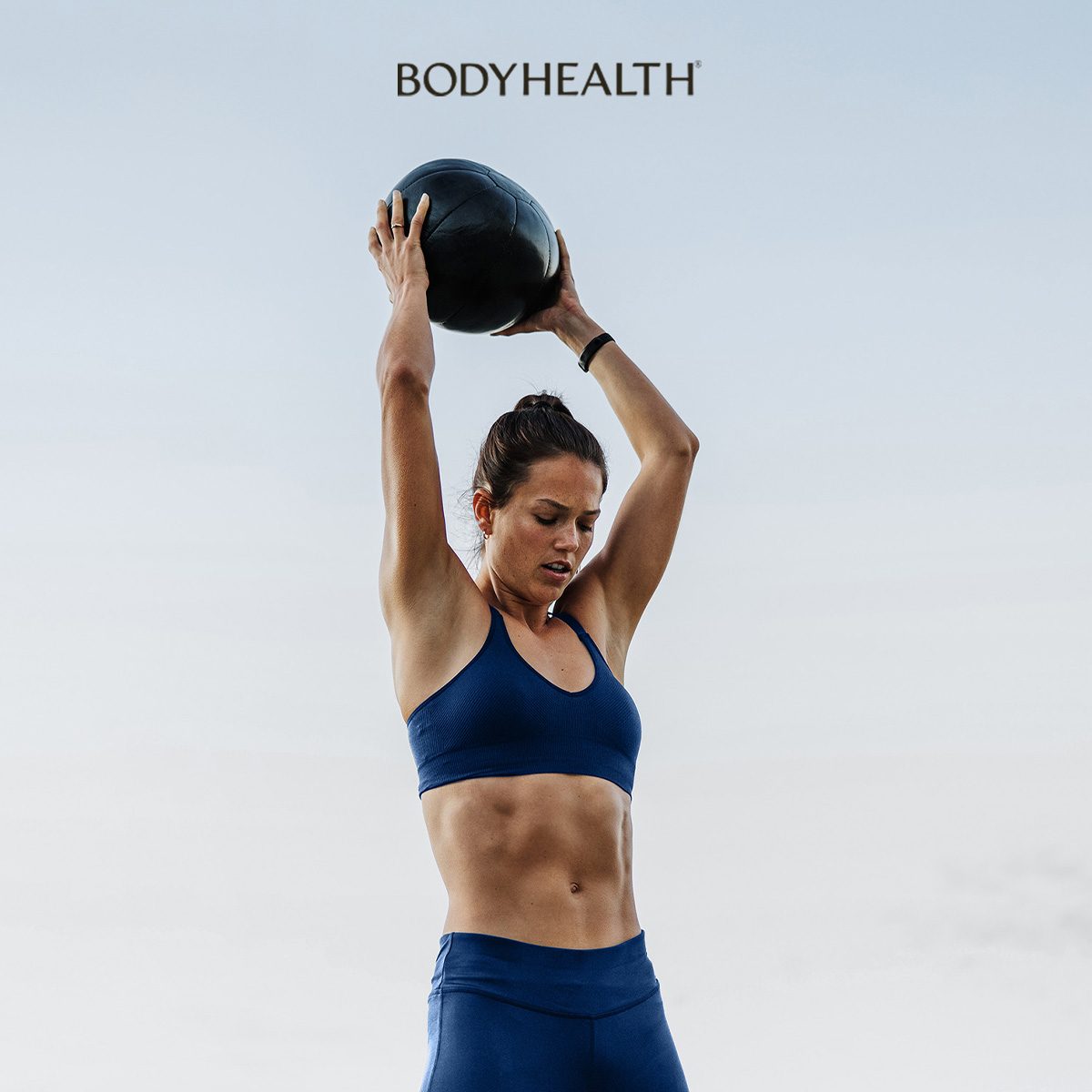 BodyHealth — athlete training with a medicine ball